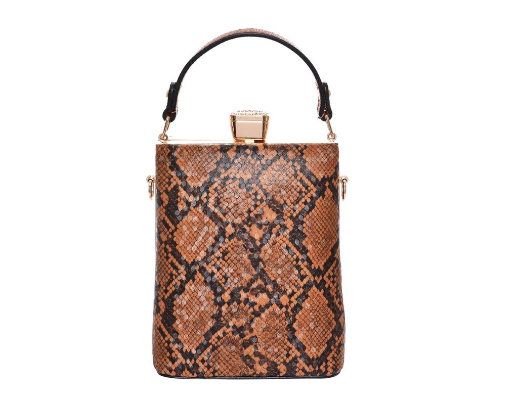 Lucretia handbag in brown vegan leather with gold-tone hardware and adjustable strap.