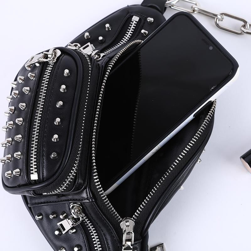 Moto Rivets Fanny Crossbody Bag in black studded vegan leather with adjustable chain strap and multiple zipper pockets.
