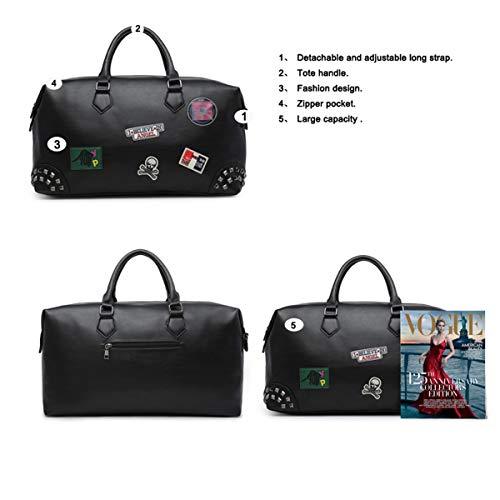 Oversized travel bag in black synthetic leather with metal zippers, showcasing its spacious interior and adjustable crossbody strap.