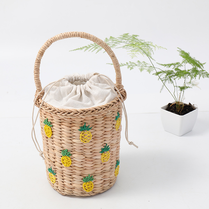 Wicker basket with pineapple design.