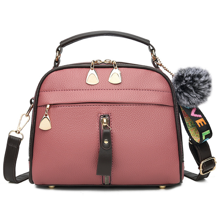 A stylish PU leather messenger bag for ladies, featuring a sleek design and compact size, perfect for everyday use.