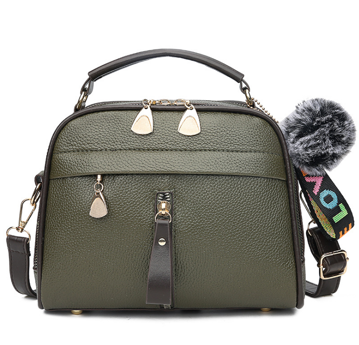 A stylish PU leather messenger bag for ladies, featuring a sleek design and compact size, perfect for everyday use.