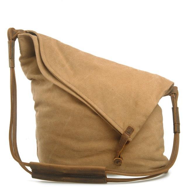 A stylish Retro Art Cloth Crossbody Bag for Women featuring a unique design, high-density canvas material, and adjustable cowhide shoulder strap.