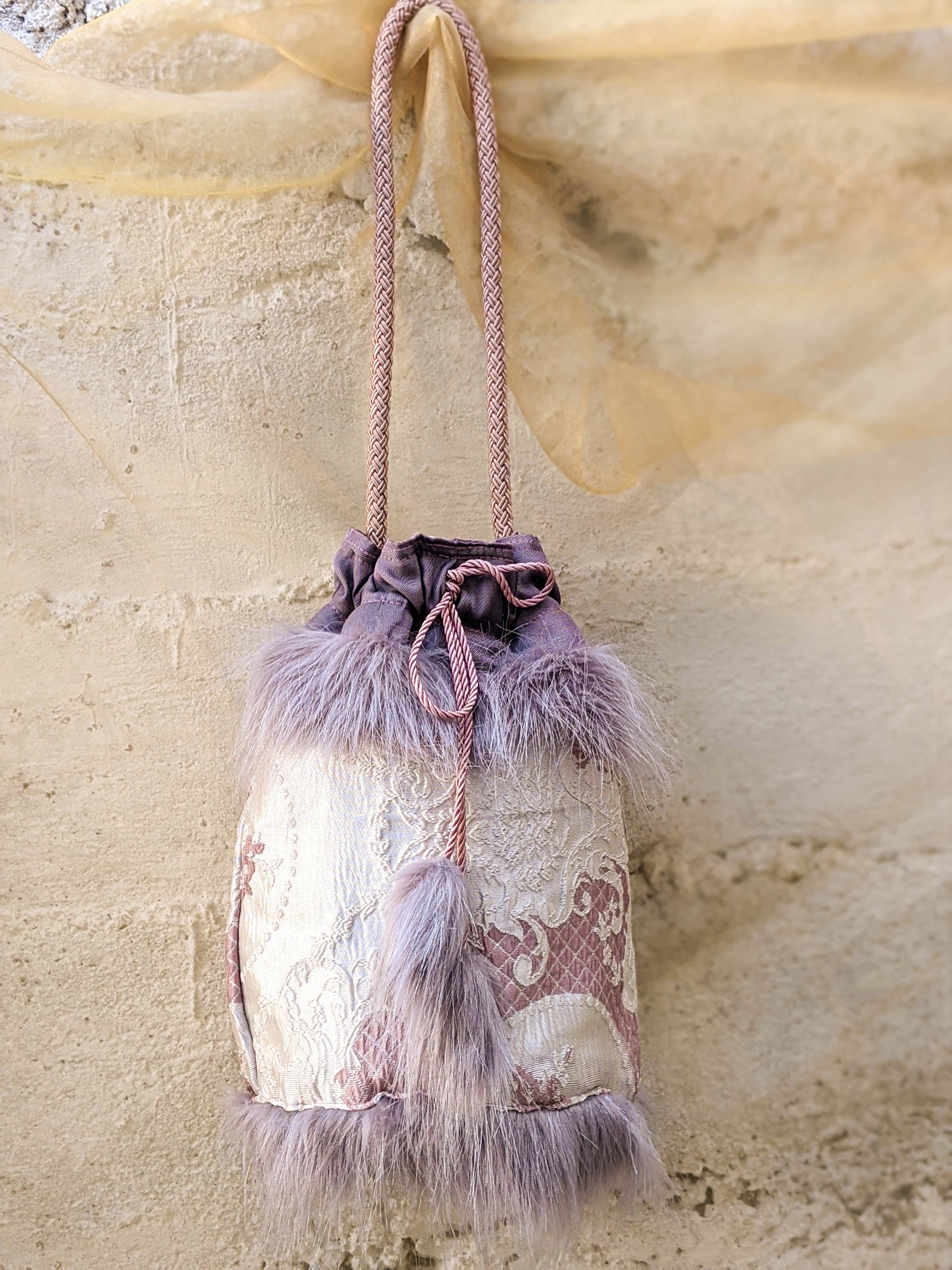 Elegant Victorian style Ribbon Jasper bucket bag with brocade fabric and lilac-grey fur details.