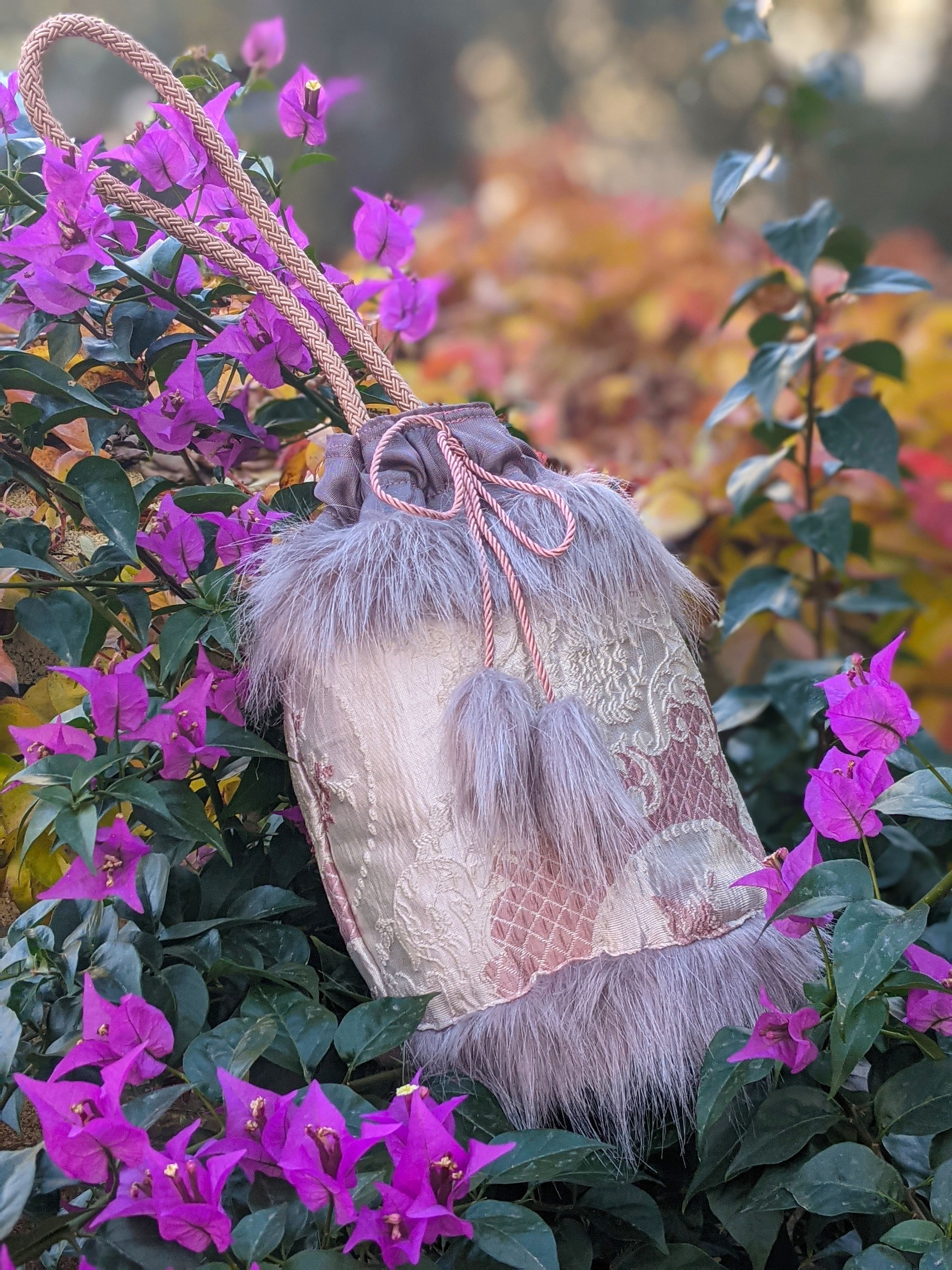 Elegant Victorian style Ribbon Jasper bucket bag with brocade fabric and lilac-grey fur details.