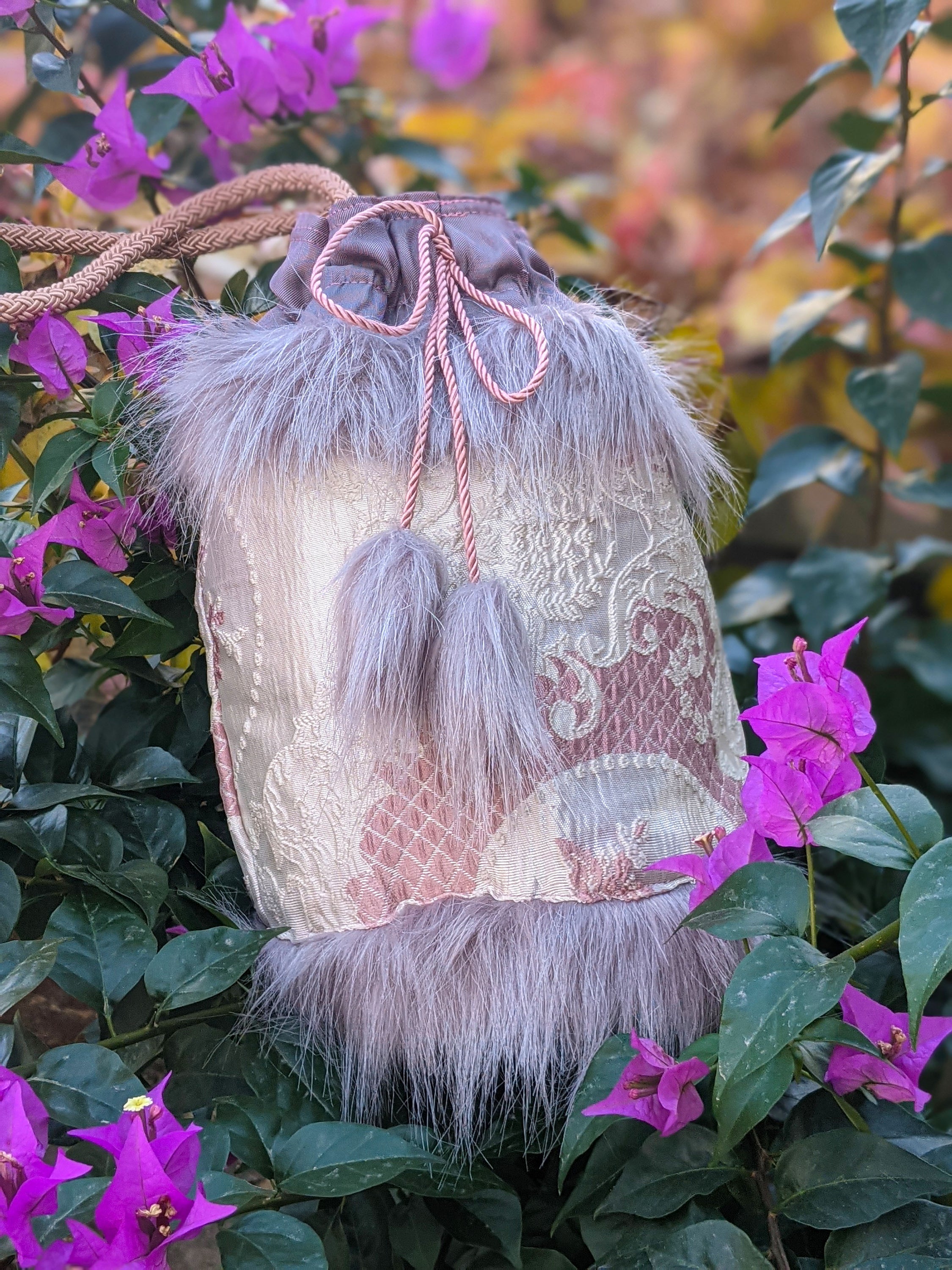 Elegant Victorian style Ribbon Jasper bucket bag with brocade fabric and lilac-grey fur details.