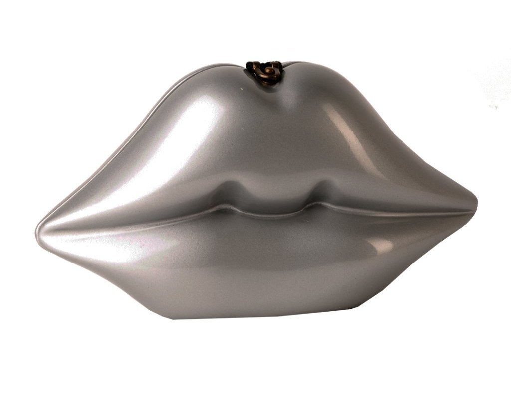 Handmade Silver Lips sculpture featuring a black lacquer body and vibrant red hand-painted lips, showcasing 60's fashion inspiration.