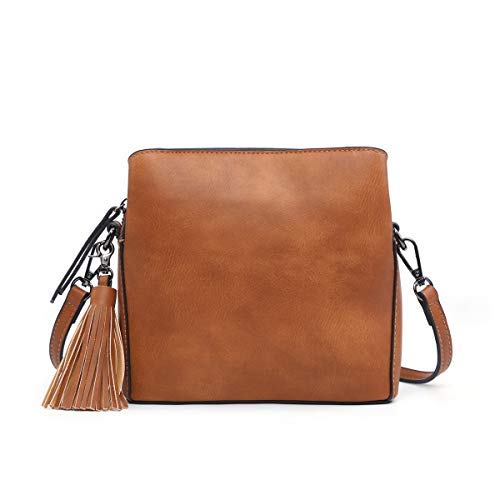 Small tan crossbody bag made of vegan leather with triple compartments and pewter fittings, showcasing multiple pockets for organization.