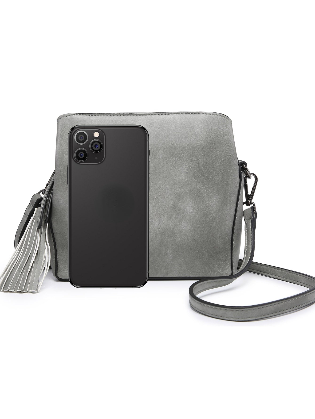 Small crossbody bag in vegan leather with triple compartments and pewter fitting, showcasing its stylish design and practicality.