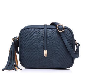 Solid Color Leisure Female Crossbody Bag in matte PU material, showcasing its stylish design and compact size.