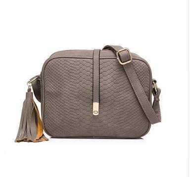 Solid Color Leisure Female Crossbody Bag in matte PU material, showcasing its stylish design and compact size.