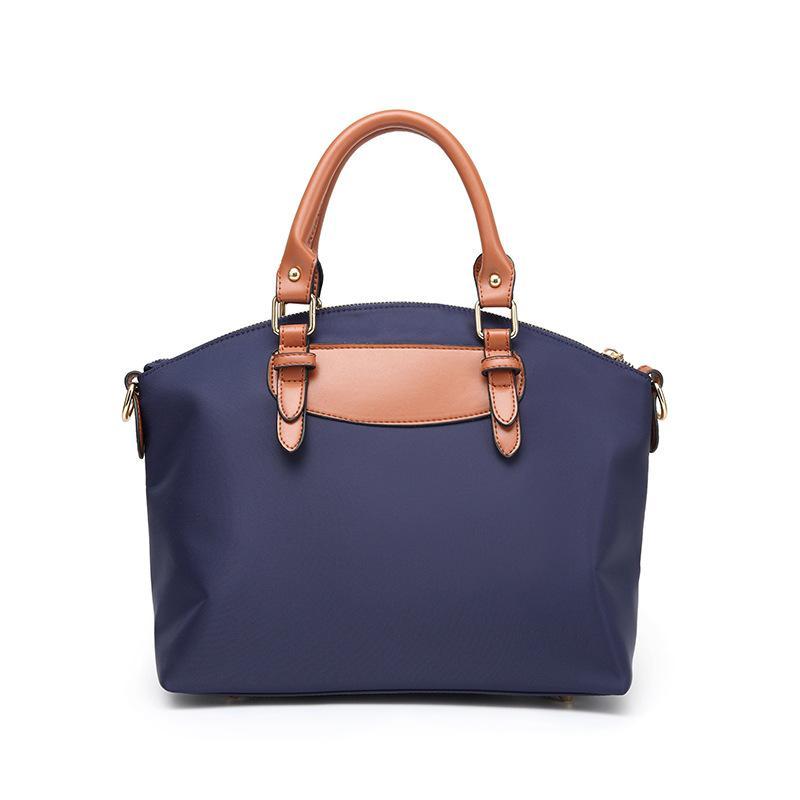 Two-piece set of stylish nylon cloth handbags for women, featuring a large and small bag in a modern design.