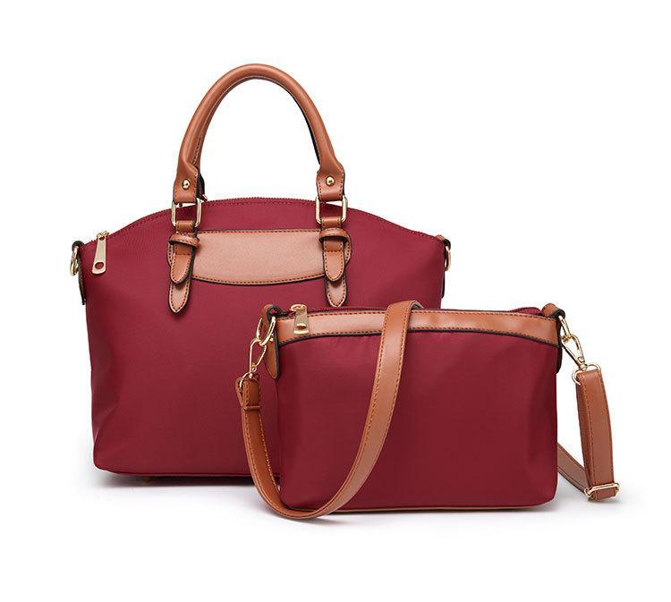 Two-piece set of stylish nylon cloth handbags for women, featuring a large and small bag in a modern design.
