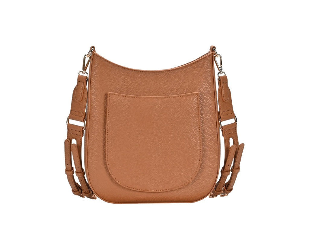 Viany handbag made of tan vegan leather with adjustable shoulder straps and three compartments, showcasing its stylish design and functionality.