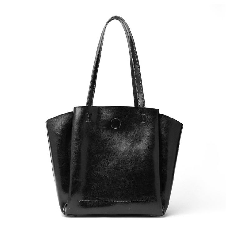 A stylish Women's Fashion Pleated Leather Handbag made from premium cowhide, featuring elegant pleats and a spacious interior.