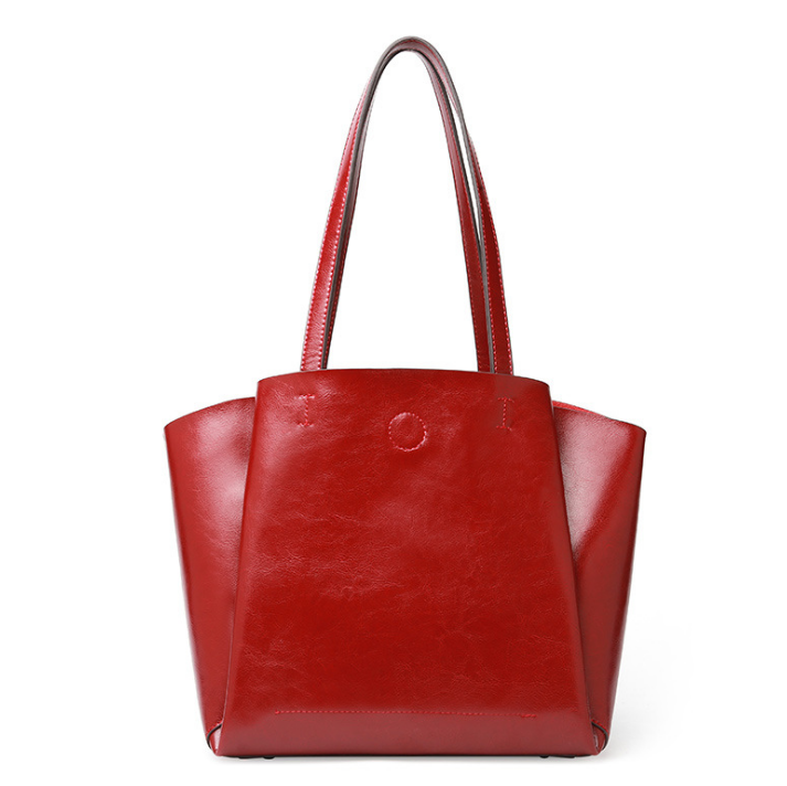 A stylish Women's Fashion Pleated Leather Handbag made from premium cowhide, featuring elegant pleats and a spacious interior.