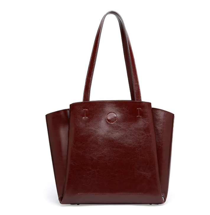 A stylish Women's Fashion Pleated Leather Handbag made from premium cowhide, featuring elegant pleats and a spacious interior.