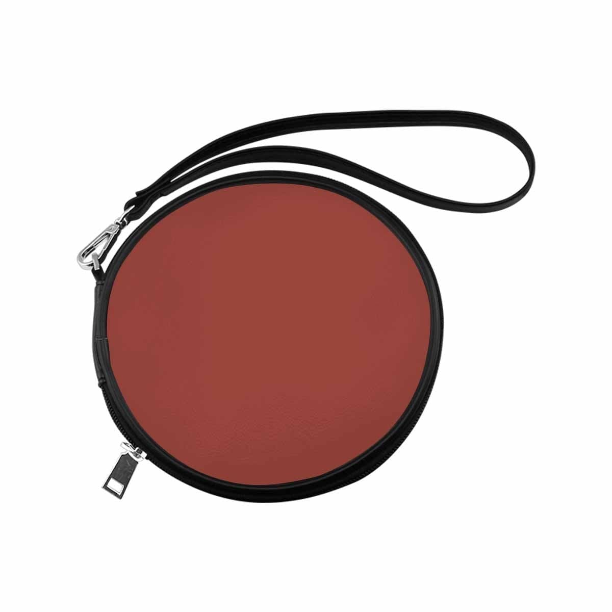 Womens Round Handbag in Cognac Red, made of high-grade PU leather with a wristlet strap, showcasing its stylish round shape.