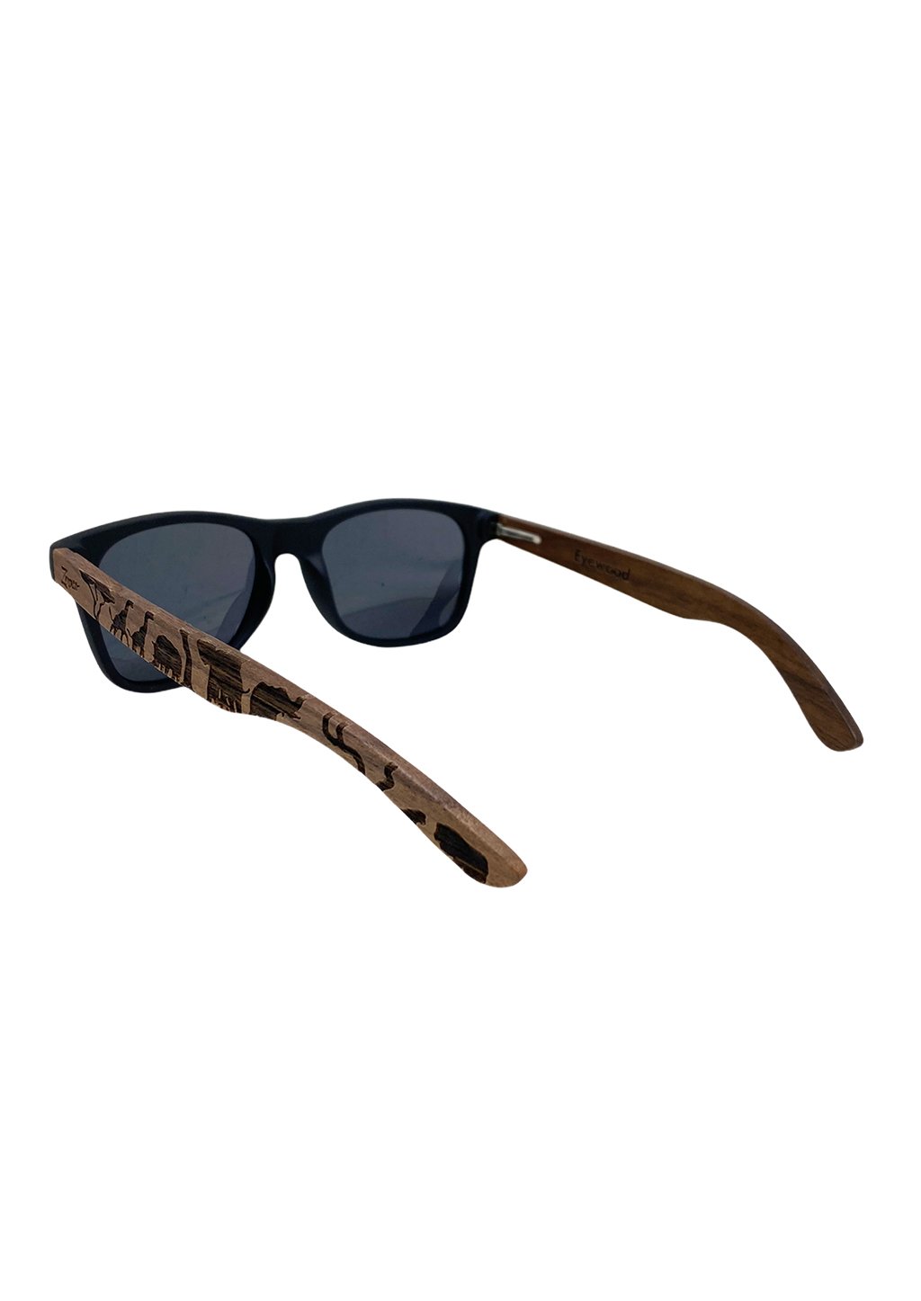 Eyewood Untamed engraved wooden sunglasses featuring unique tiger patterns on walnut temples and polarized black lenses.