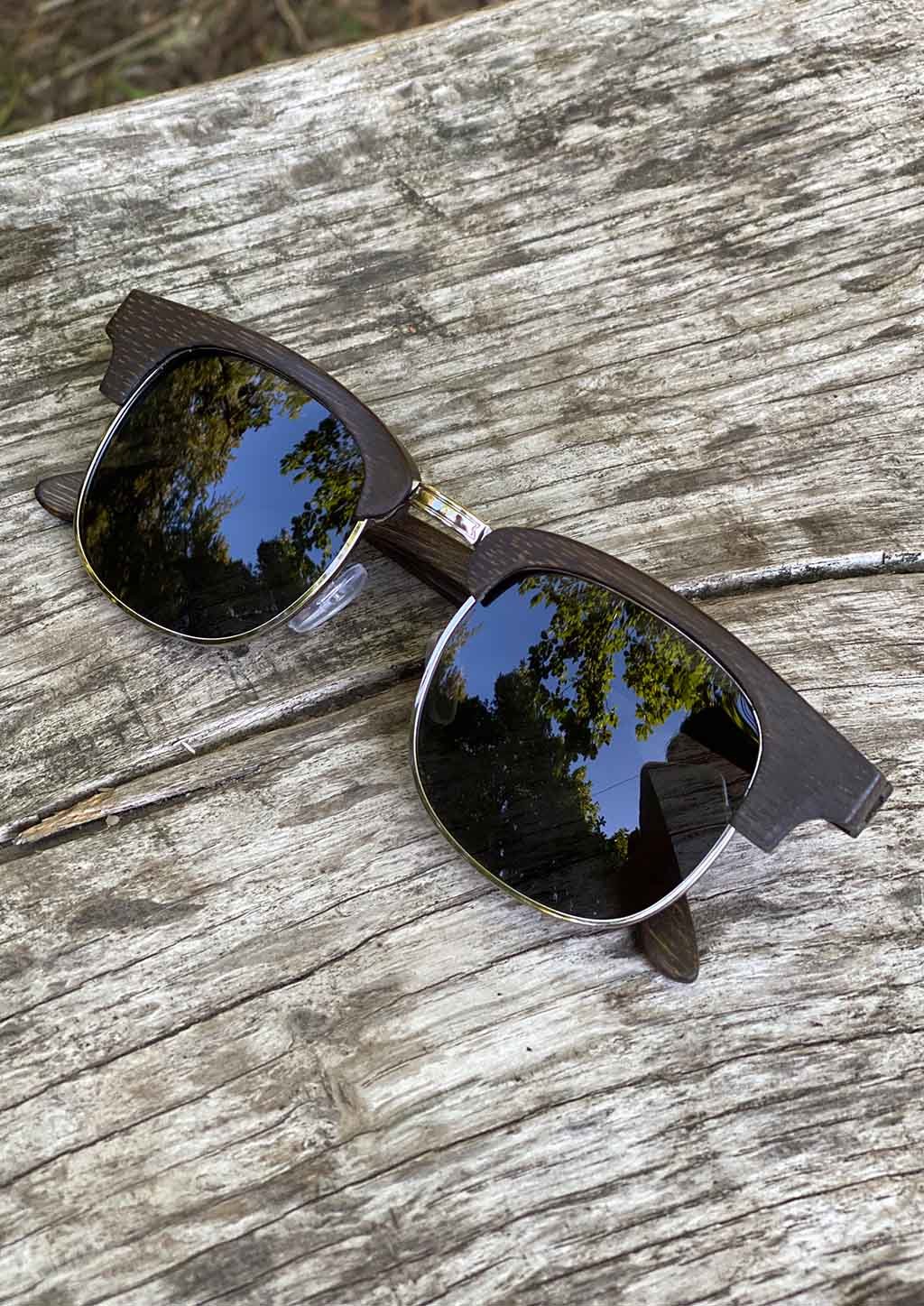 Eyewood Full Wood Clubmaster - Skyler sunglasses featuring a full wooden frame, polarized black lenses, and stainless steel hinges.