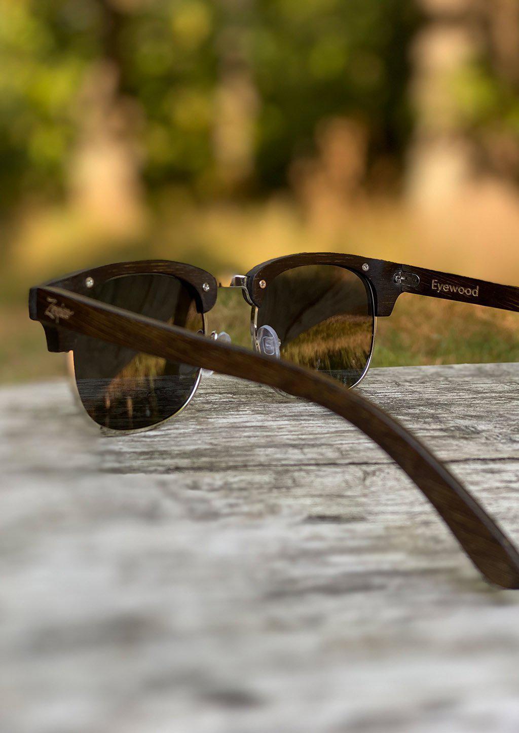 Eyewood Full Wood Clubmaster - Skyler sunglasses featuring a full wooden frame, polarized black lenses, and stainless steel hinges.