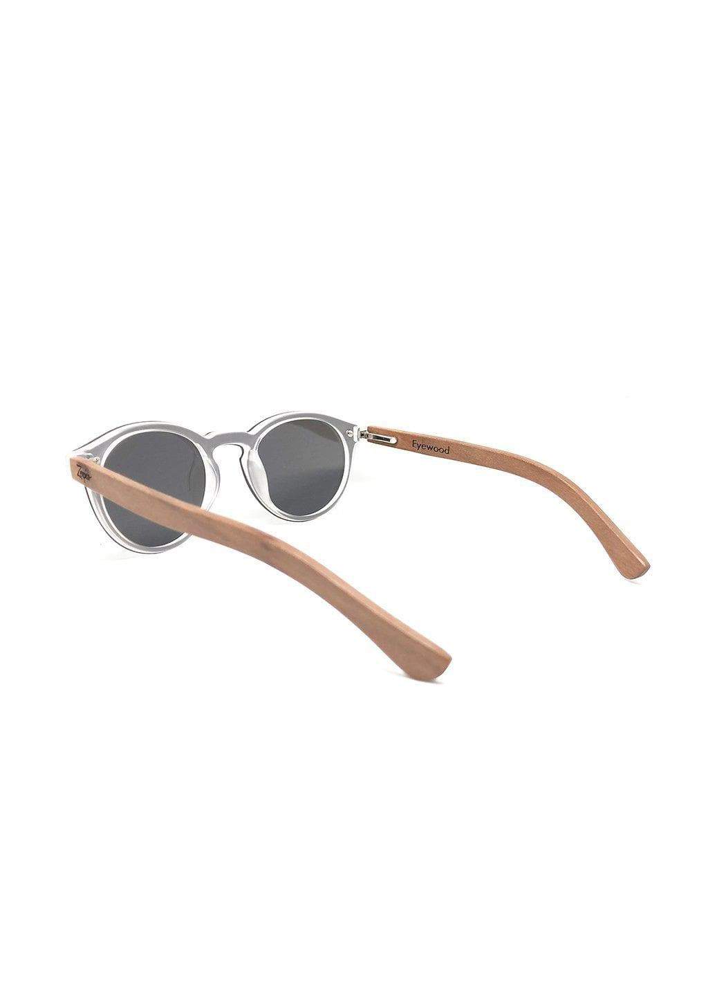 Eyewood Tomorrow - Orion wooden sunglasses featuring rosewood frame and polarized black lenses, elegantly displayed in a handmade empress tree case.