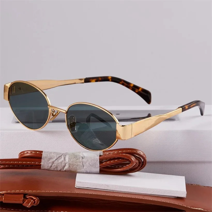 Gold Metal Frame Oval Small Sunglasses from Sexikinis Swim, featuring a sleek alloy frame and UV400 lenses, perfect for stylish summer outings.