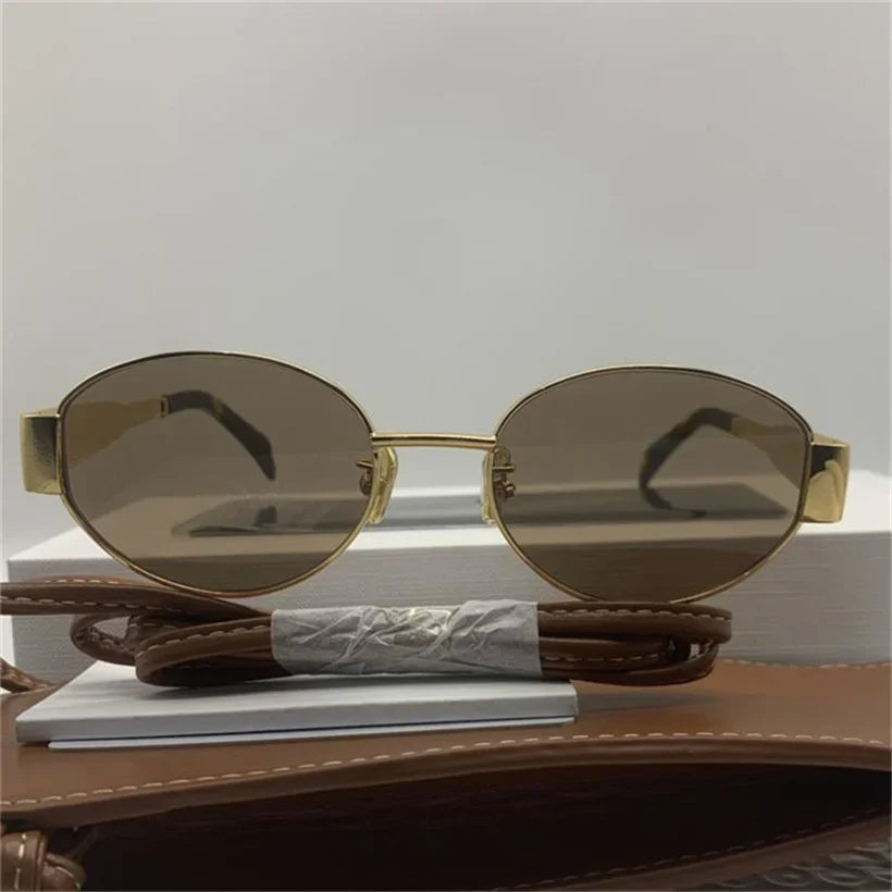 Gold Metal Frame Oval Small Sunglasses from Sexikinis Swim, featuring a sleek alloy frame and UV400 lenses, perfect for stylish summer outings.