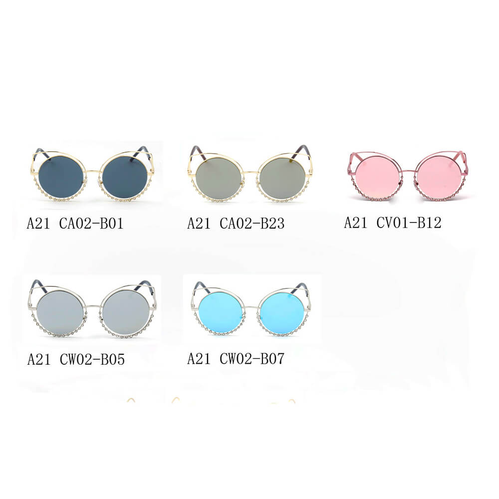 Holland Pearl-Studded Cut-Out Cat Eye Princess Sunglasses with a unique design and mirrored lenses.