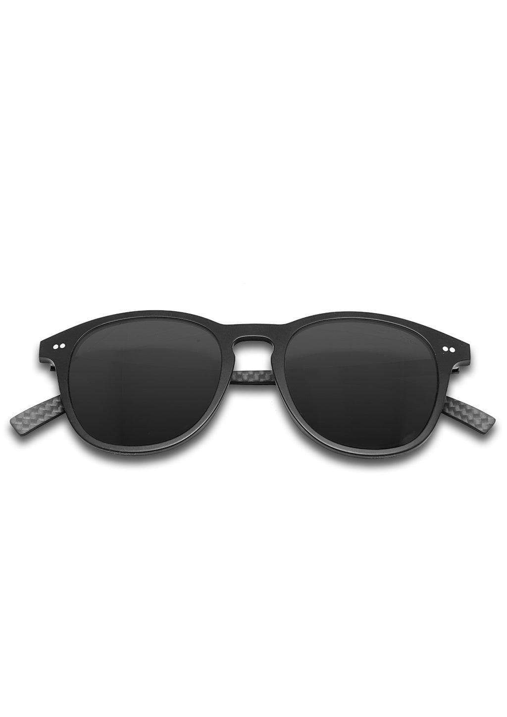 Hybrid Halo sunglasses featuring a round design with carbon fiber and acetate materials, showcasing various lens colors.