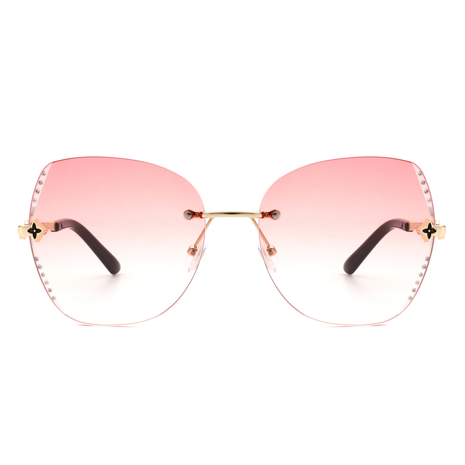 Kineticx Oversize Rimless Butterfly Sunglasses with tinted lenses and rhinestone accents, showcasing a stylish and glamorous design.