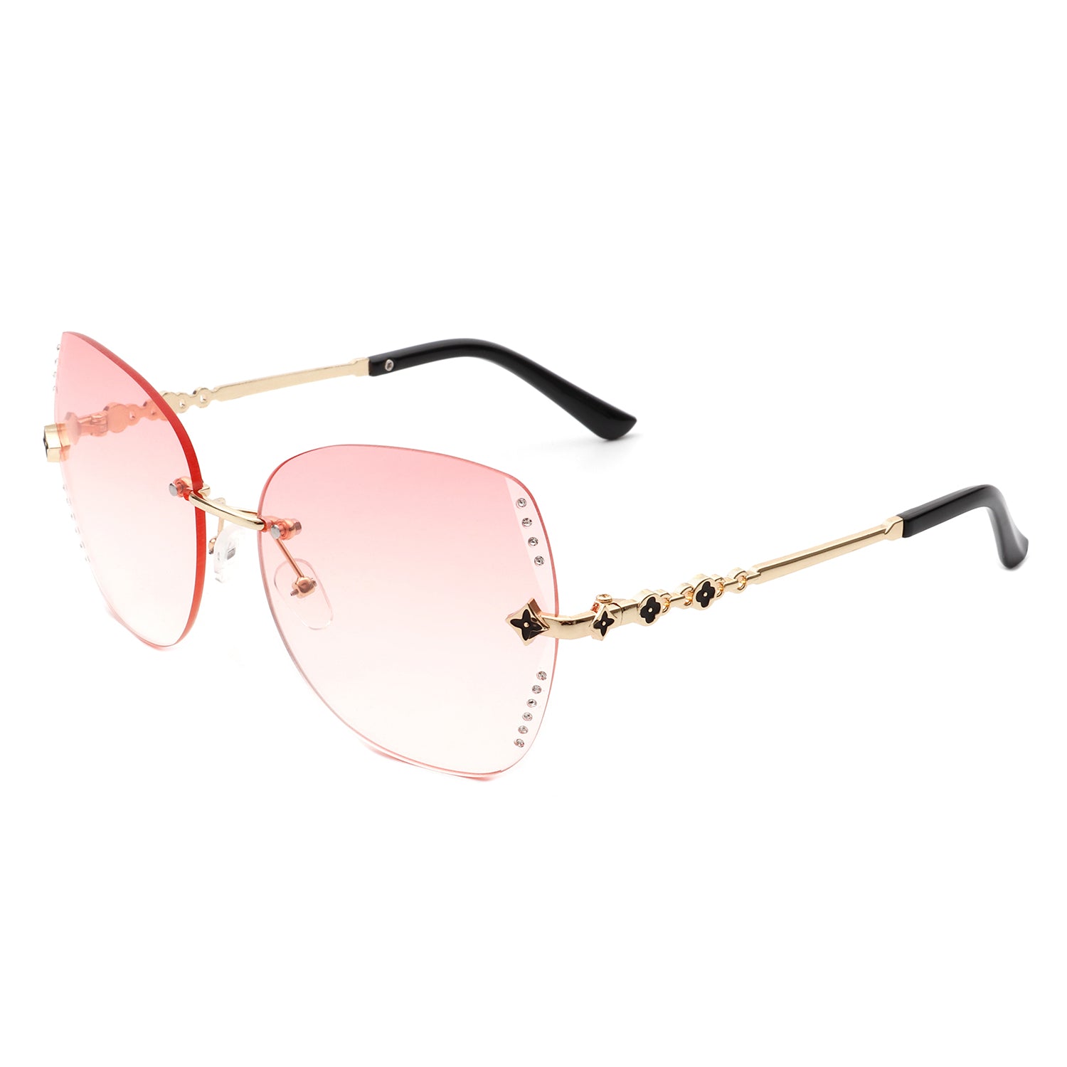 Kineticx Oversize Rimless Butterfly Sunglasses with tinted lenses and rhinestone accents, showcasing a stylish and glamorous design.