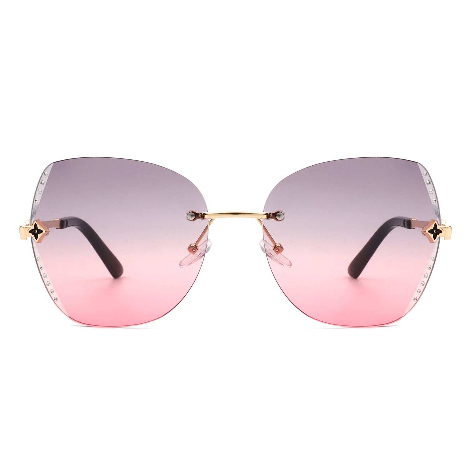 Kineticx Oversize Rimless Butterfly Sunglasses with tinted lenses and rhinestone accents, showcasing a stylish and glamorous design.