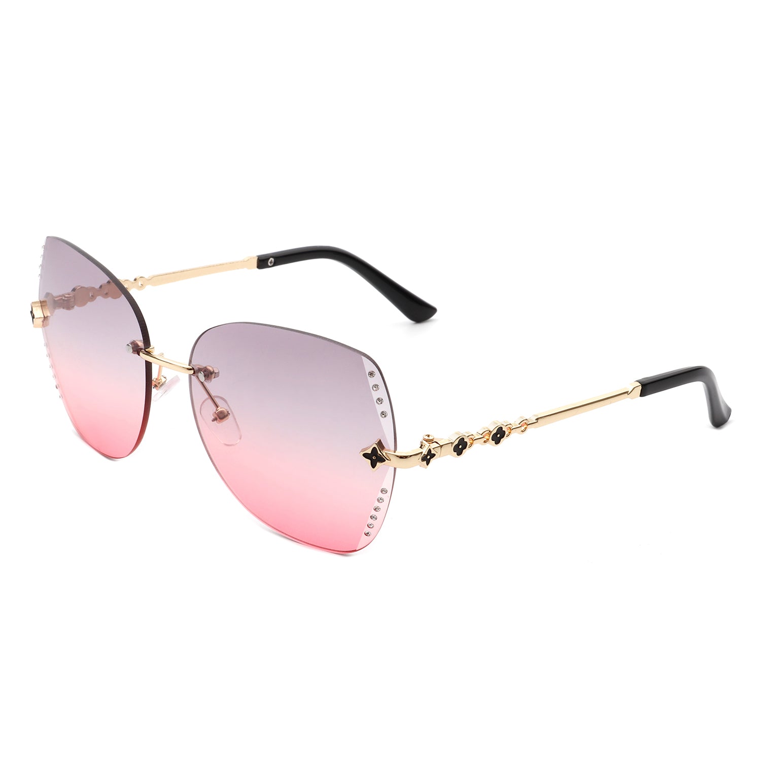 Kineticx Oversize Rimless Butterfly Sunglasses with tinted lenses and rhinestone accents, showcasing a stylish and glamorous design.