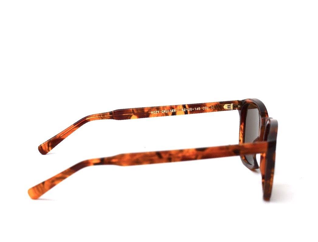 Kozy Cruiser Tortoise eyewear featuring a stylish tortoise shell frame and Zeiss CR39 lenses.