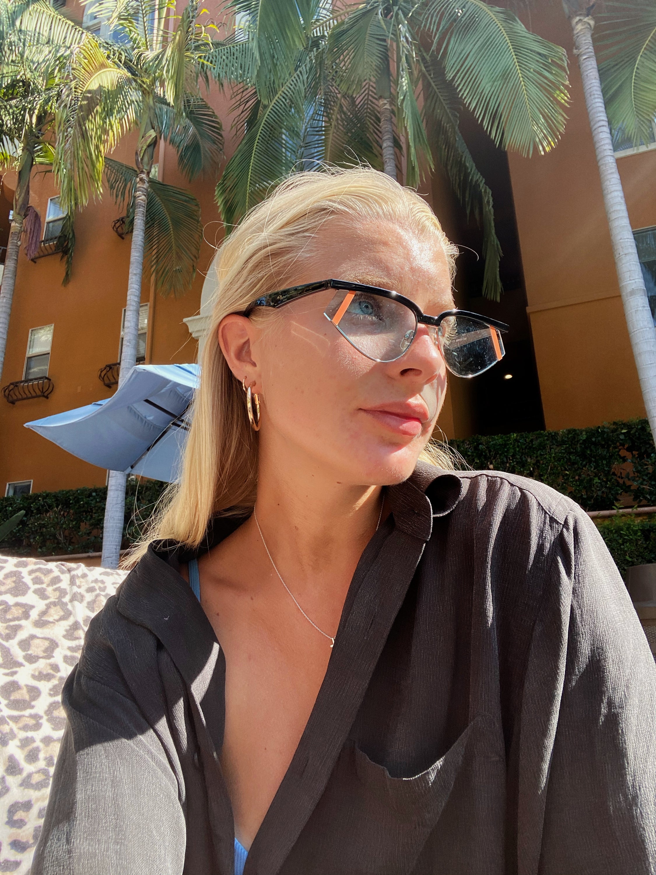 Laramie Futuristic Rectangle Fashion Sunglasses with a sleek plastic frame and clear PC lenses, offering stylish UV protection.