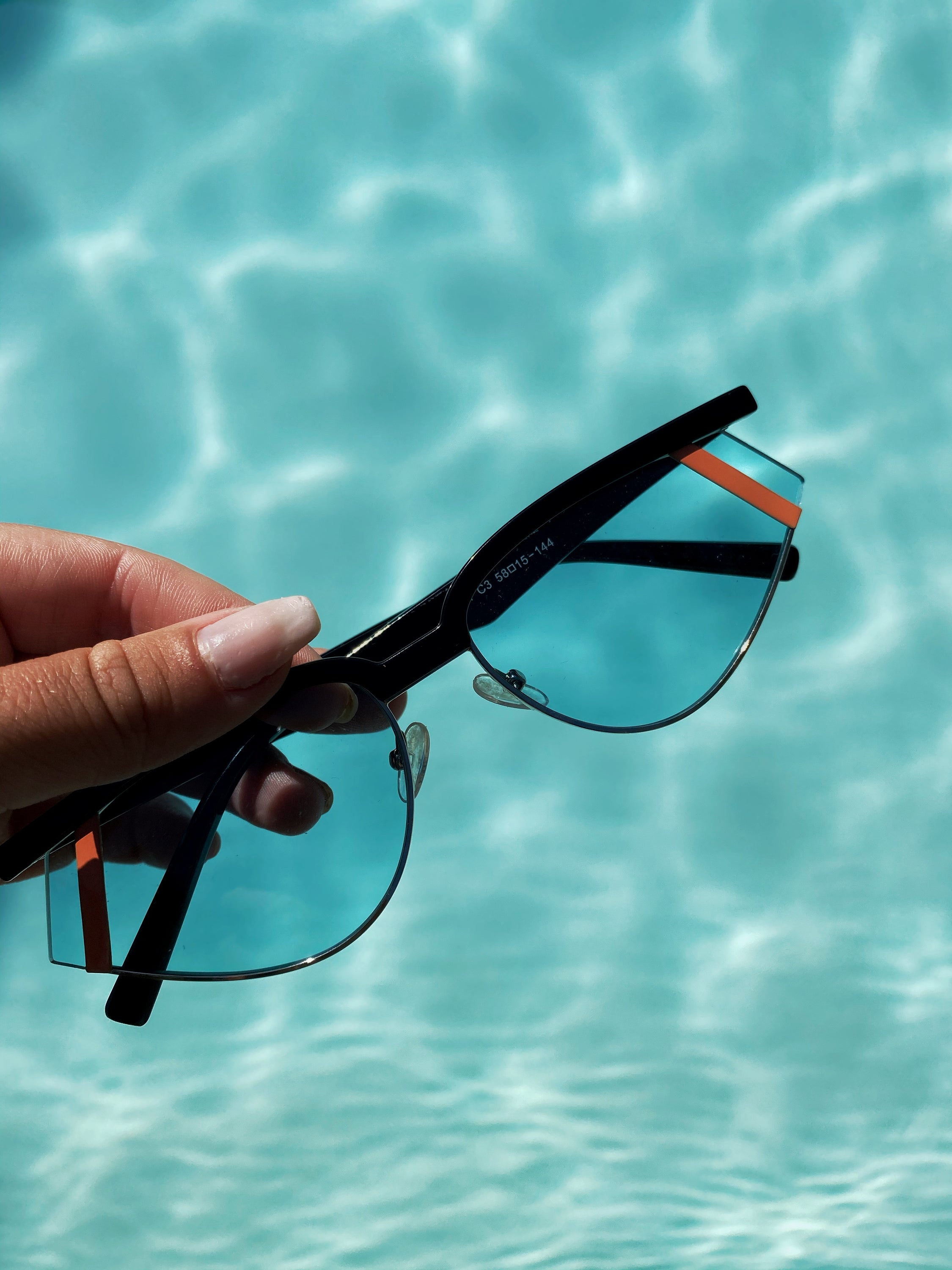 Laramie Futuristic Rectangle Fashion Sunglasses with a sleek plastic frame and clear PC lenses, offering stylish UV protection.