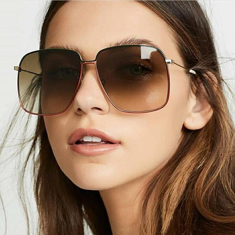Large frame square sunglasses for women, showcasing a classic retro design with metal construction, perfect for street style.