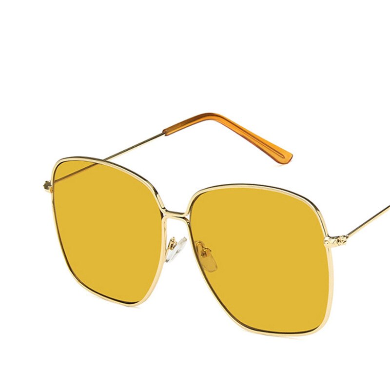 Large frame square sunglasses for women, showcasing a classic retro design with metal construction, perfect for street style.