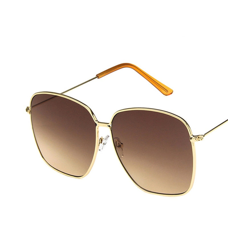 Large frame square sunglasses for women, showcasing a classic retro design with metal construction, perfect for street style.