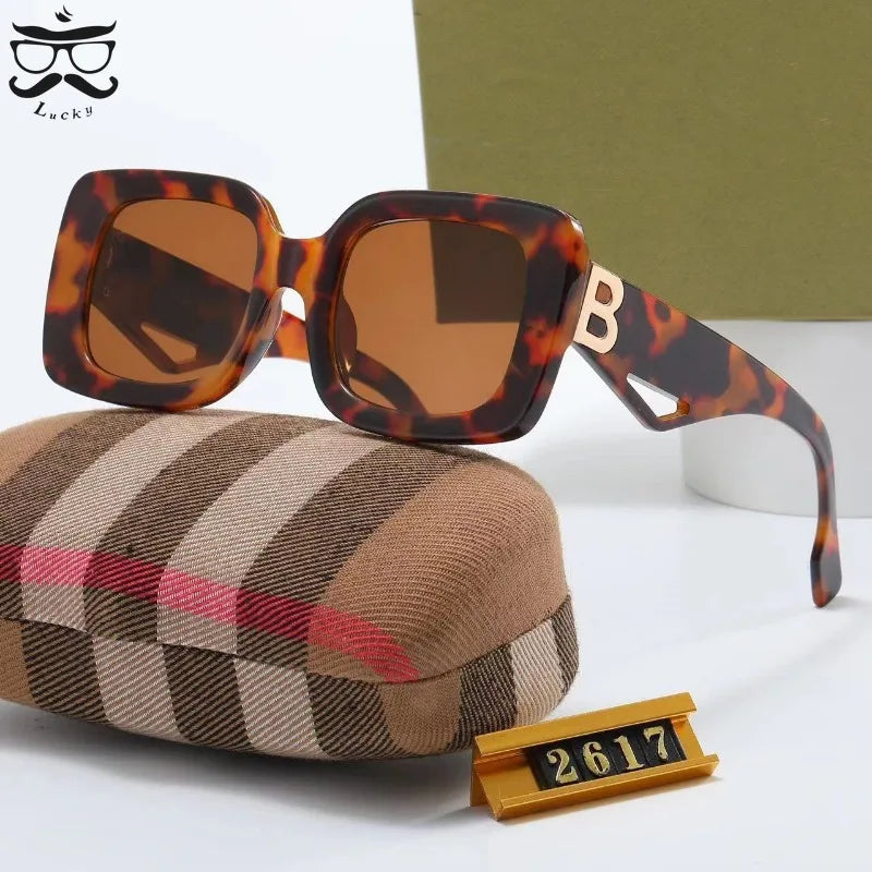 Luxury Retro Large Frame Sunglasses with a stylish plastic square frame and UV400 lenses, perfect for strong women.