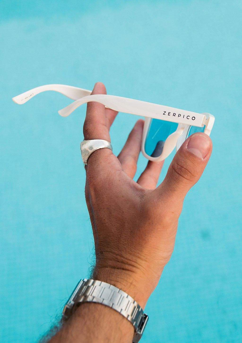 MOOD Wayfarer V2 - Husky sunglasses featuring a solid white frame and blue polarized lenses, perfect for stylish sun protection.