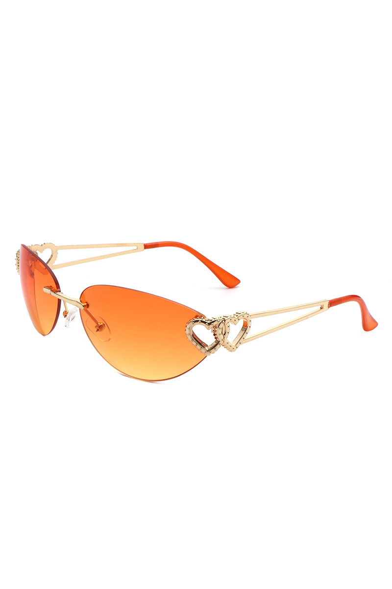 Myral Women's Chic Frameless Oval Heart Cat Eye Sunglasses showcasing a stylish design with a heart twist, perfect for fashion enthusiasts.