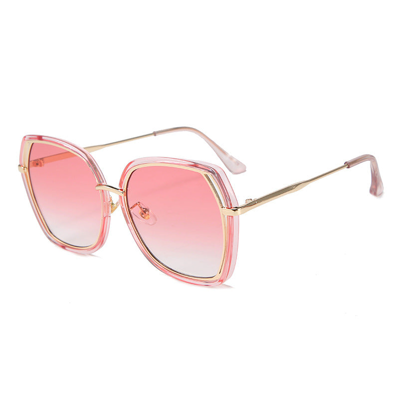 New Fashion Hollow Frame Street Fashion Sunglasses with irregular large frame design, available in multiple lens colors.
