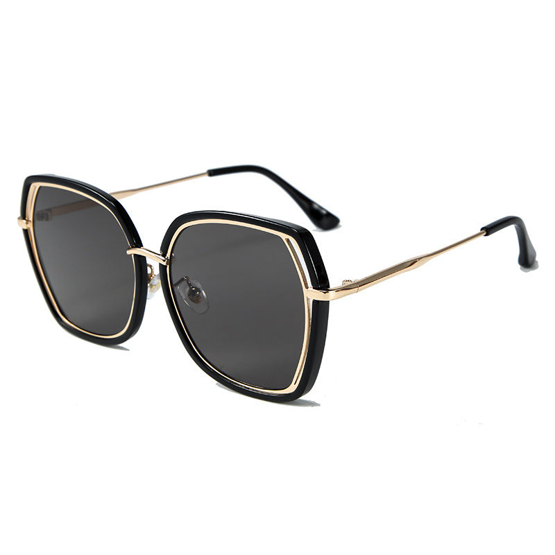 New Fashion Hollow Frame Street Fashion Sunglasses with irregular large frame design, available in multiple lens colors.