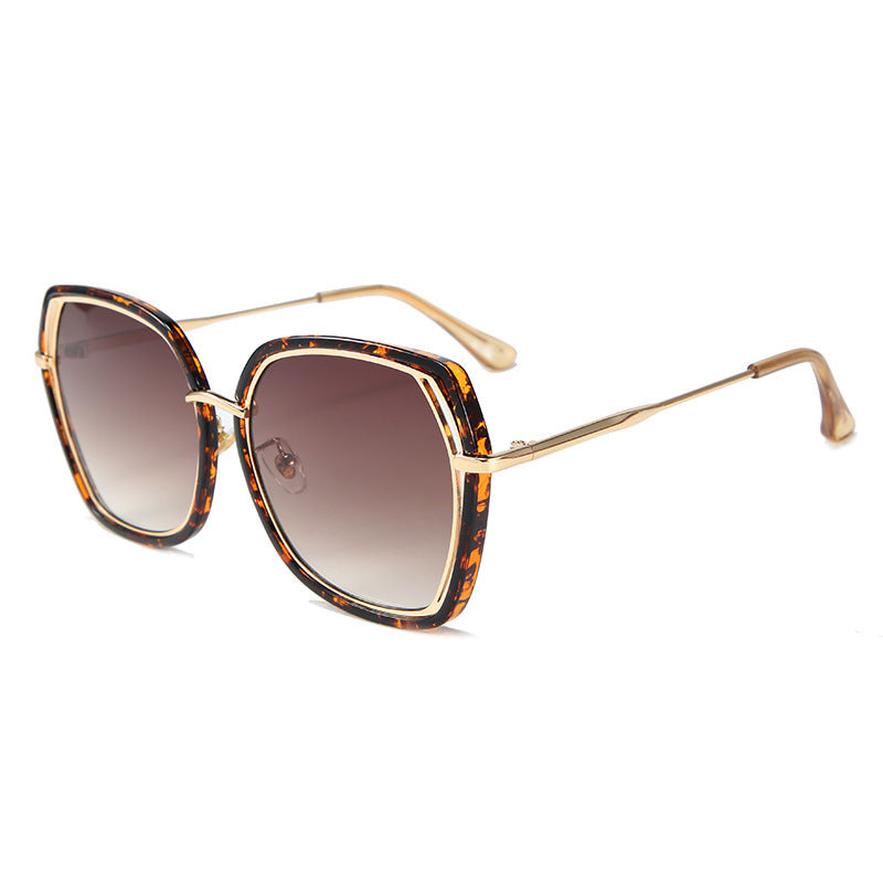 New Fashion Hollow Frame Street Fashion Sunglasses with irregular large frame design, available in multiple lens colors.