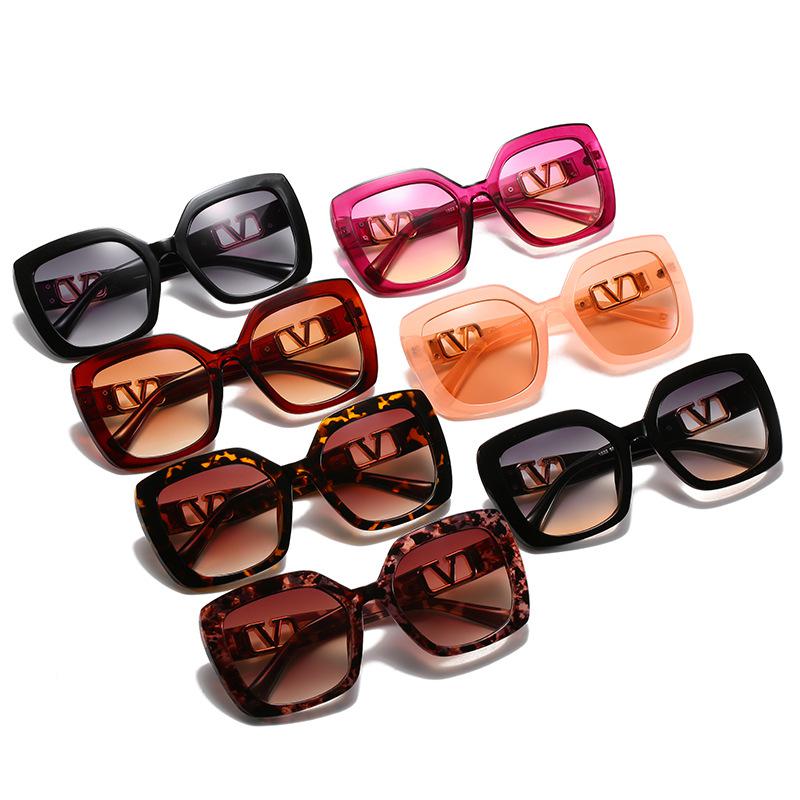 A pair of stylish New Fashion Square V-Shaped Sunglasses for women, featuring a large frame and modern design.