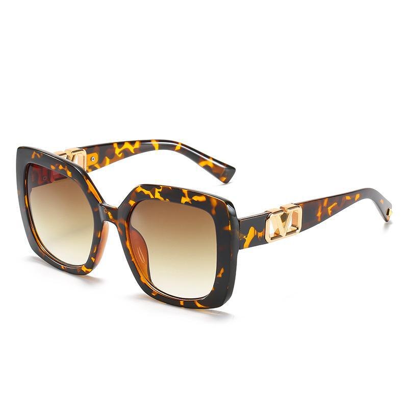 A pair of stylish New Fashion Square V-Shaped Sunglasses for women, featuring a large frame and modern design.