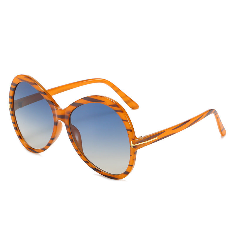 A pair of trendy big frame sunglasses showcasing a unique personality style, perfect for fashion enthusiasts.