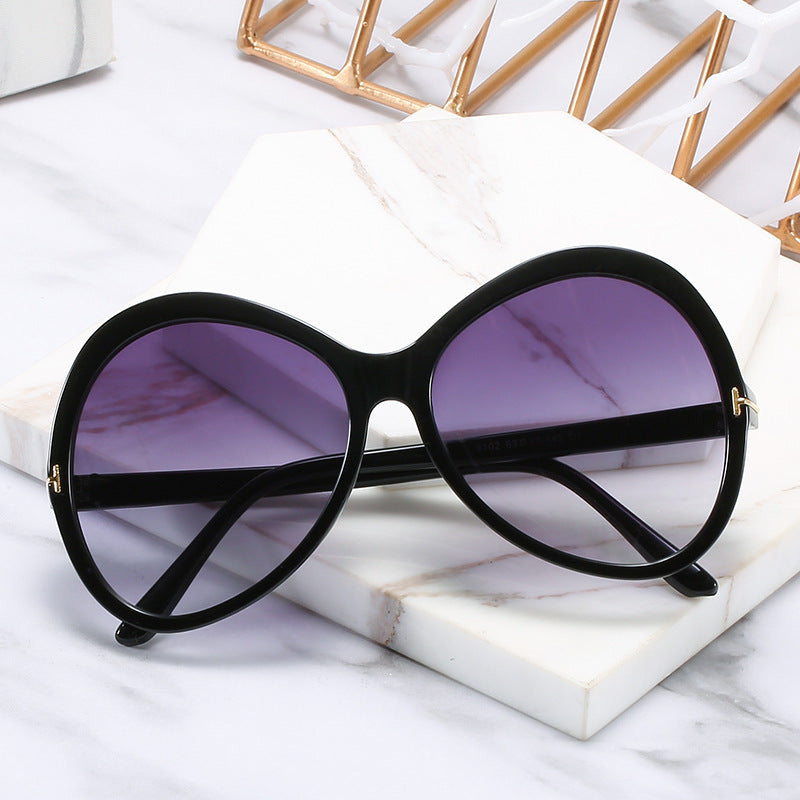 A pair of trendy big frame sunglasses showcasing a unique personality style, perfect for fashion enthusiasts.